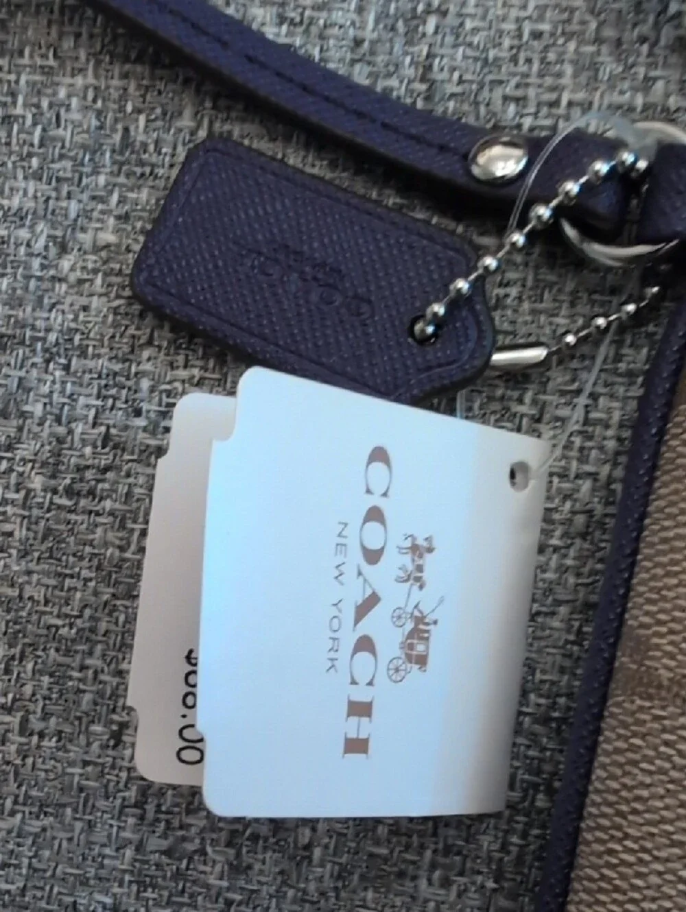 NWT Coach Khaki Signature Canvas Wristlet with Purple Trim